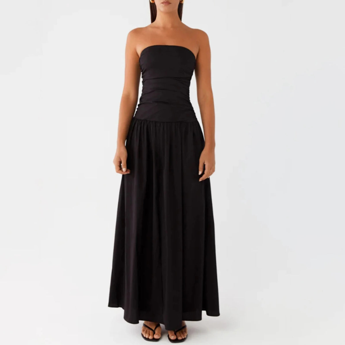 Elegant women's long sleeveless dress in caqui from Corporación Turística, featuring a sleek and stylish design for special occasions.
