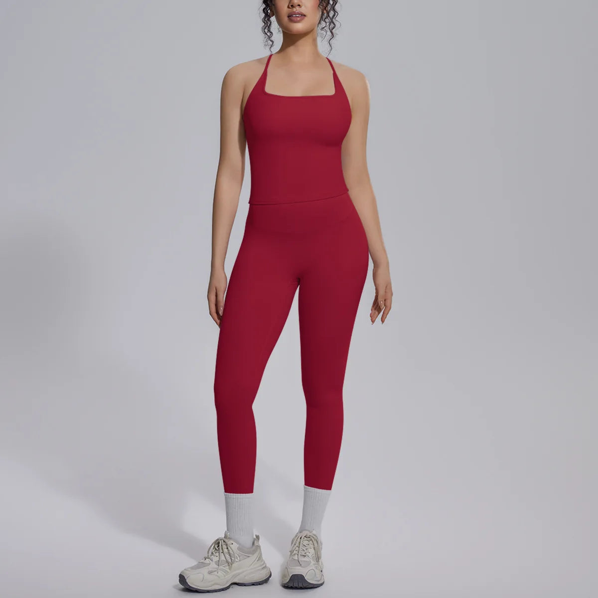 Green yoga set for women, 2-piece gym clothing by Corporación Turística, includes a fitted top and matching leggings.