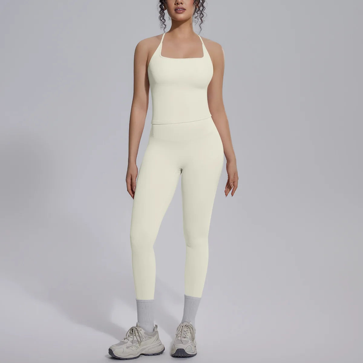 Green two-piece yoga set for women, including a fitted top and matching leggings, by Corporación Turística.