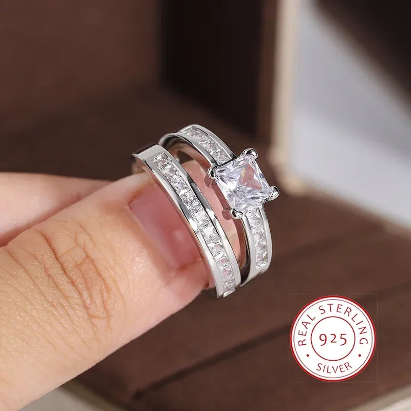 Sterling silver 925 ring with double row of cubic zirconia, featuring a shiny, elegant design.