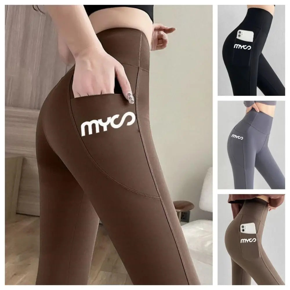 Seamless black women's leggings with a side pocket from Corporación Turística, made for comfortable active wear.