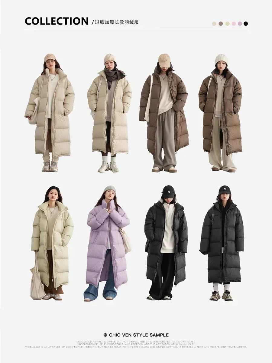 White women's duck down coat from CHIC VEN by Corporación Turística, shown hanging with a sleek, modern design.