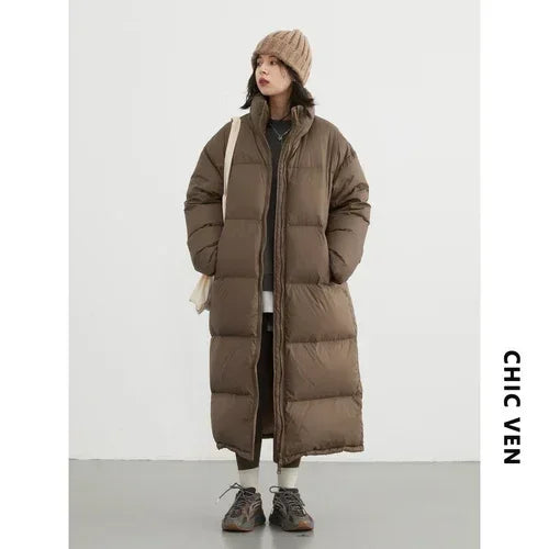White women's duck down coat from CHIC VEN by Corporación Turística, displayed on a hanger showing the full jacket.