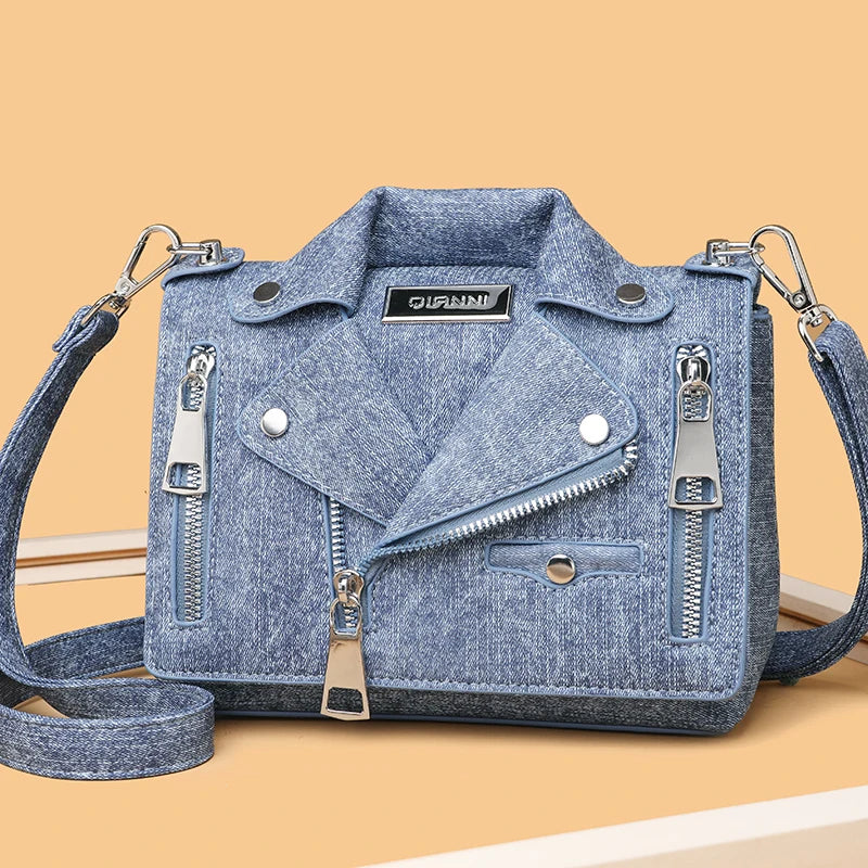 Colorful luxury cotton denim handbag by Corporación Turística with matching coin purse, measuring 22x11x19 cm, stylish and spacious.
