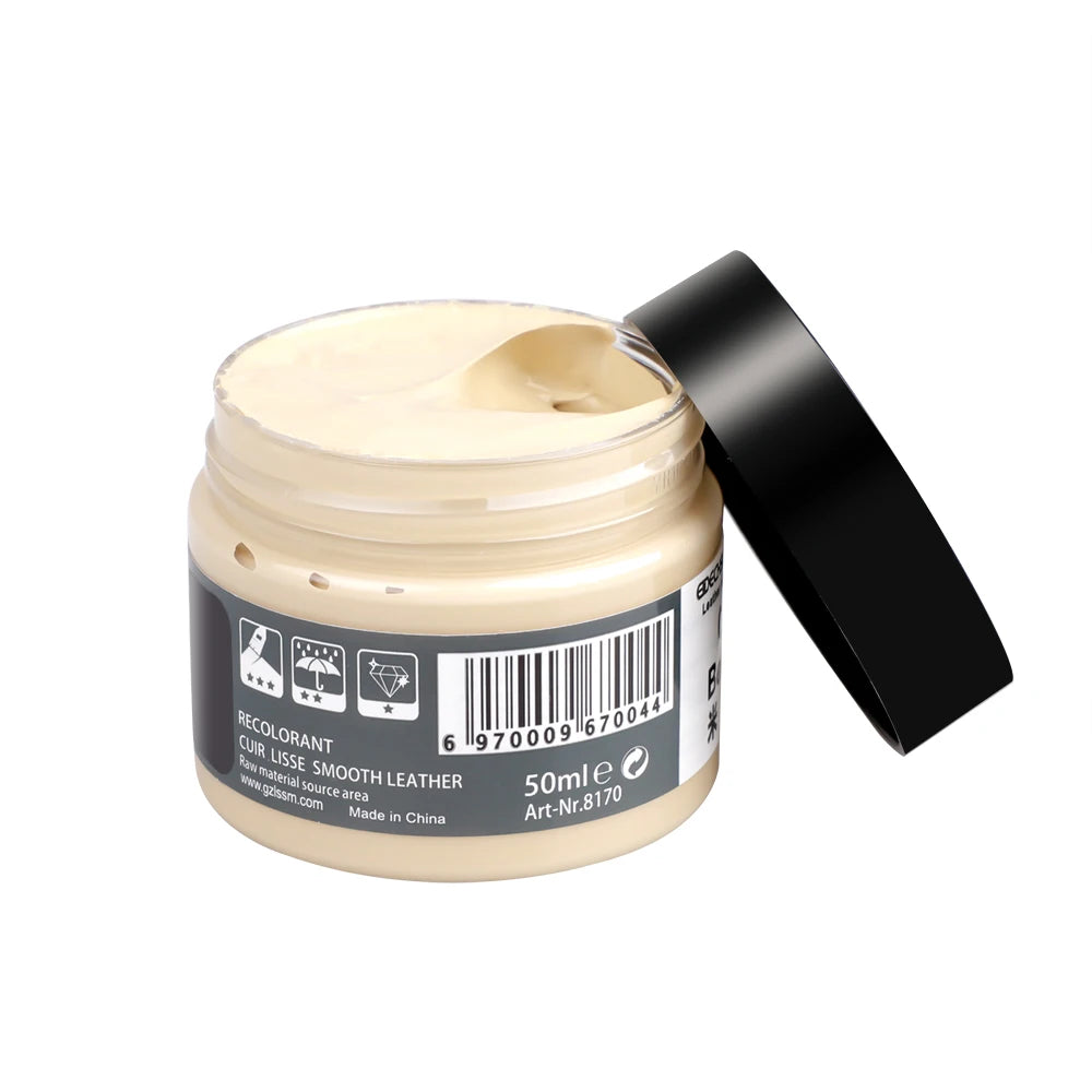 Dark blue vinyl and leather car repair kit by Corporación Turística, includes cleaner and repair tools for vehicle interiors.