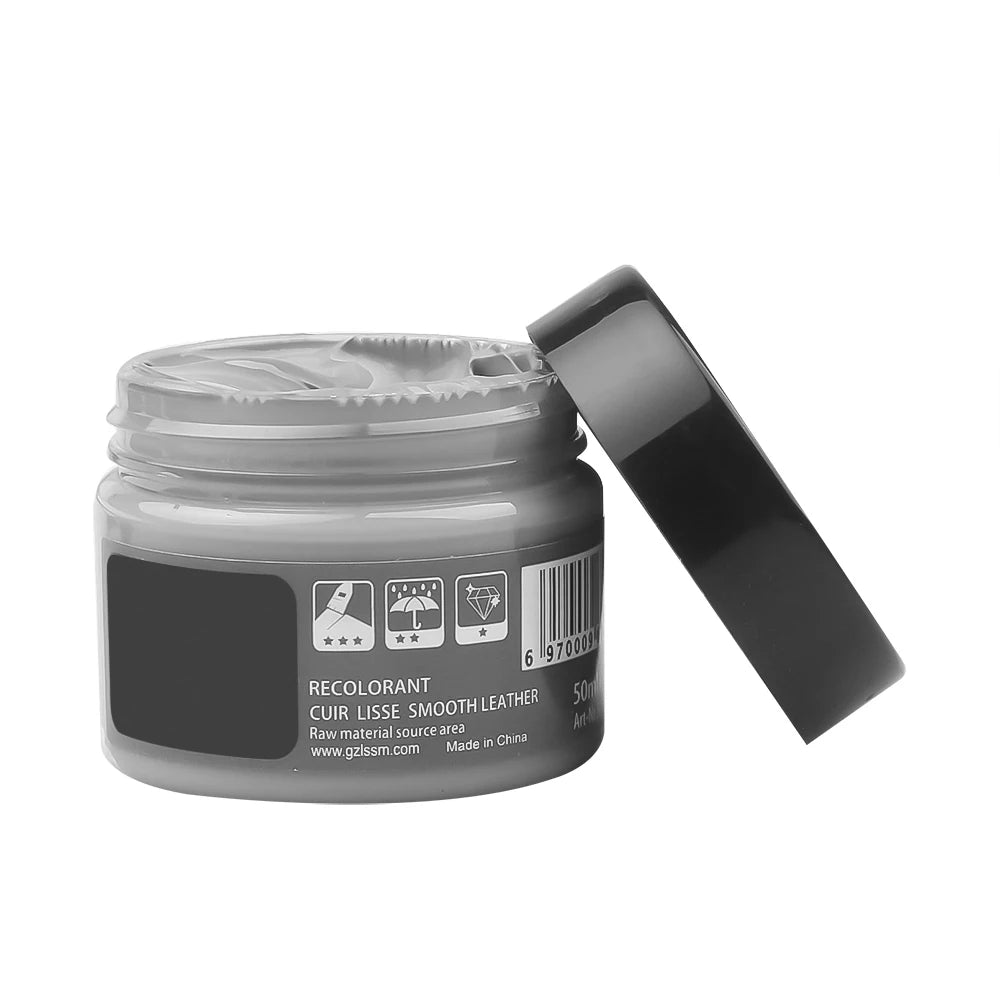 Dark blue vinyl and leather repair kit for cars by Corporación Turística, includes cleaner and repair tools for vehicle interior.