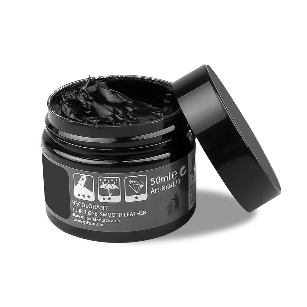 Dark blue vinyl and leather car repair kit by Corporación Turística, includes cleaning and repair tools for vehicle interiors.