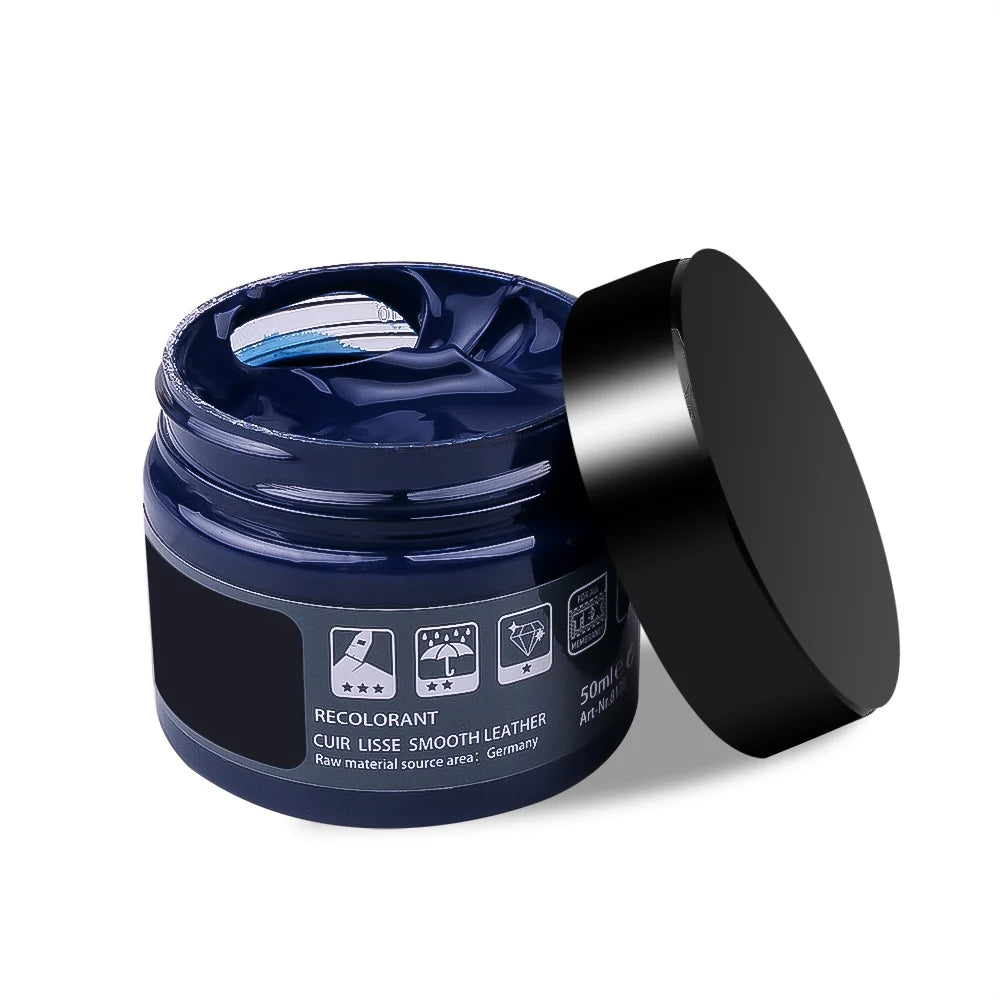 Dark blue vinyl and leather repair kit for cars by Corporación Turística, includes cleaner and repair tools for vehicle interior.