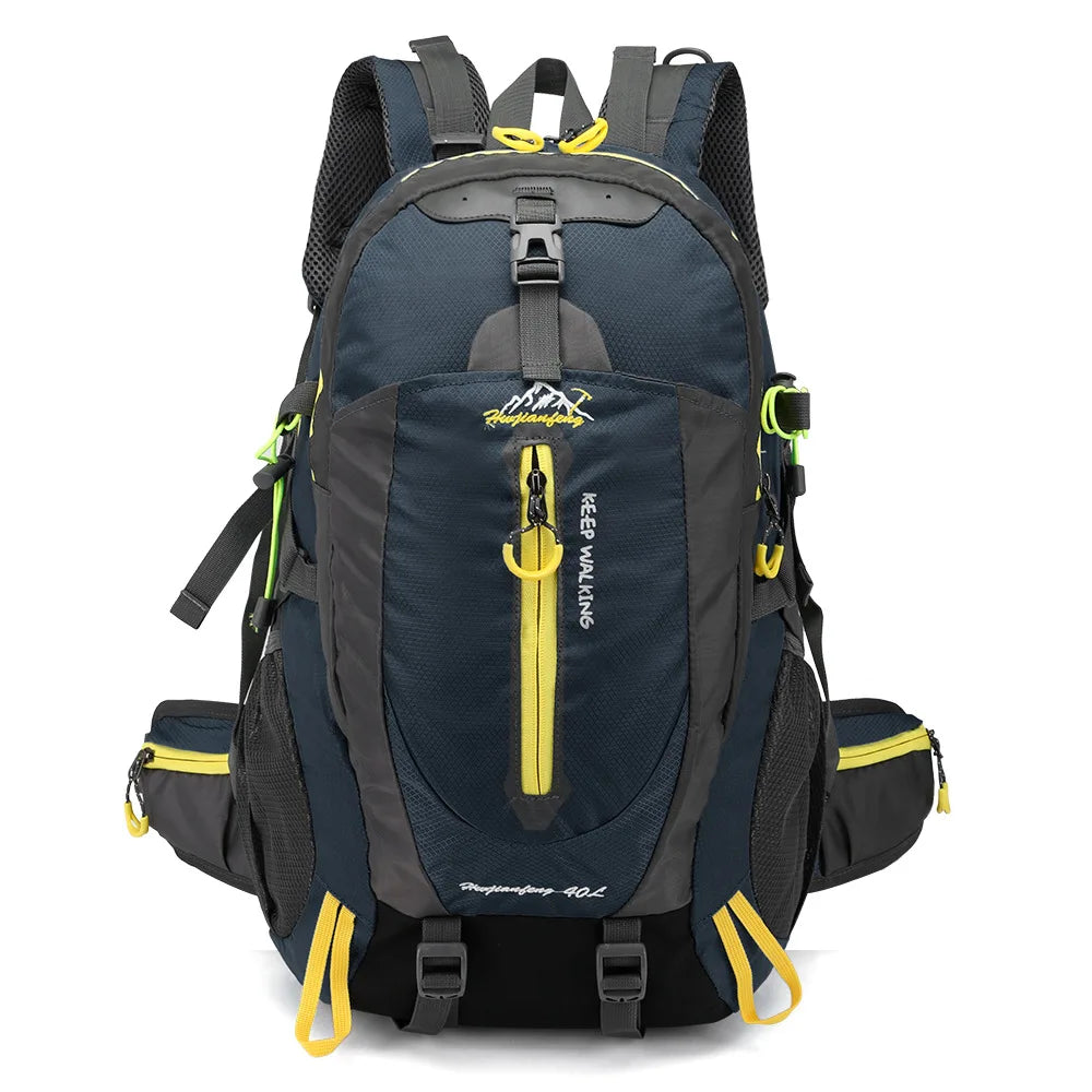 Dark blue 40L hiking backpack for men and women by Corporación Turística, featuring adjustable straps and multiple compartments.