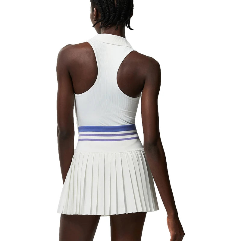 Dark blue two-piece women's yoga set with top and leggings by Corporación Turística, suitable for workout and activewear.