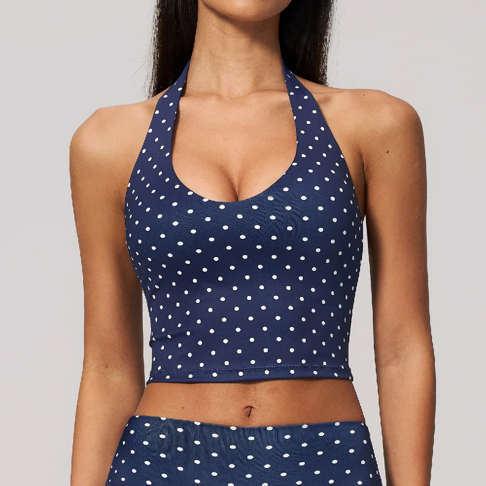 Dark blue sports halter top for yoga with wave design, by Corporación Turística, featuring supportive fit and stylish appearance.