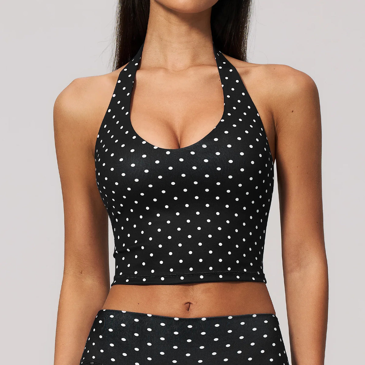 Dark blue sporty halter top for yoga with wave design, by Corporación Turística, featuring a comfortable fit for active wear.