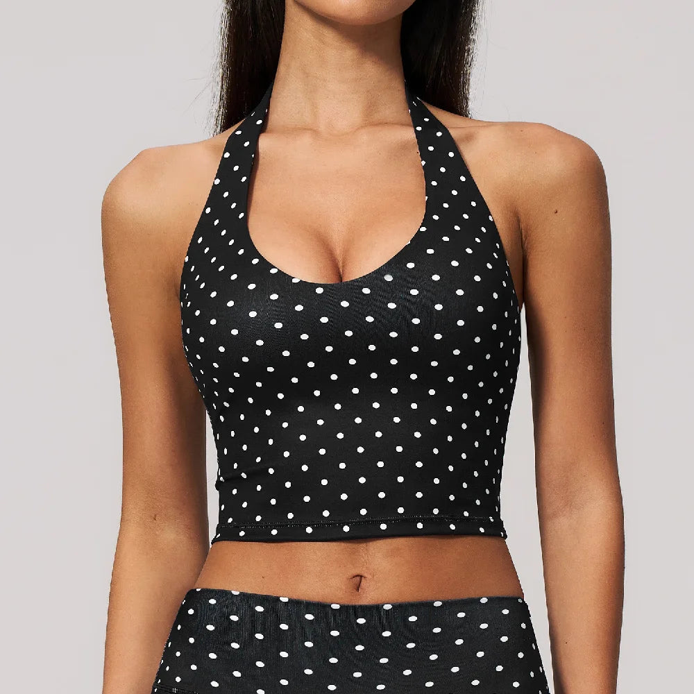 Dark blue sports halter top for yoga with wave design, by Corporación Turística, featuring a sleek, supportive fit for active wear.