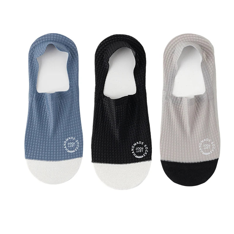 Dark grey men's invisible socks by Corporación Turística, three pairs of low-cut, breathable ankle socks for comfortable wear.