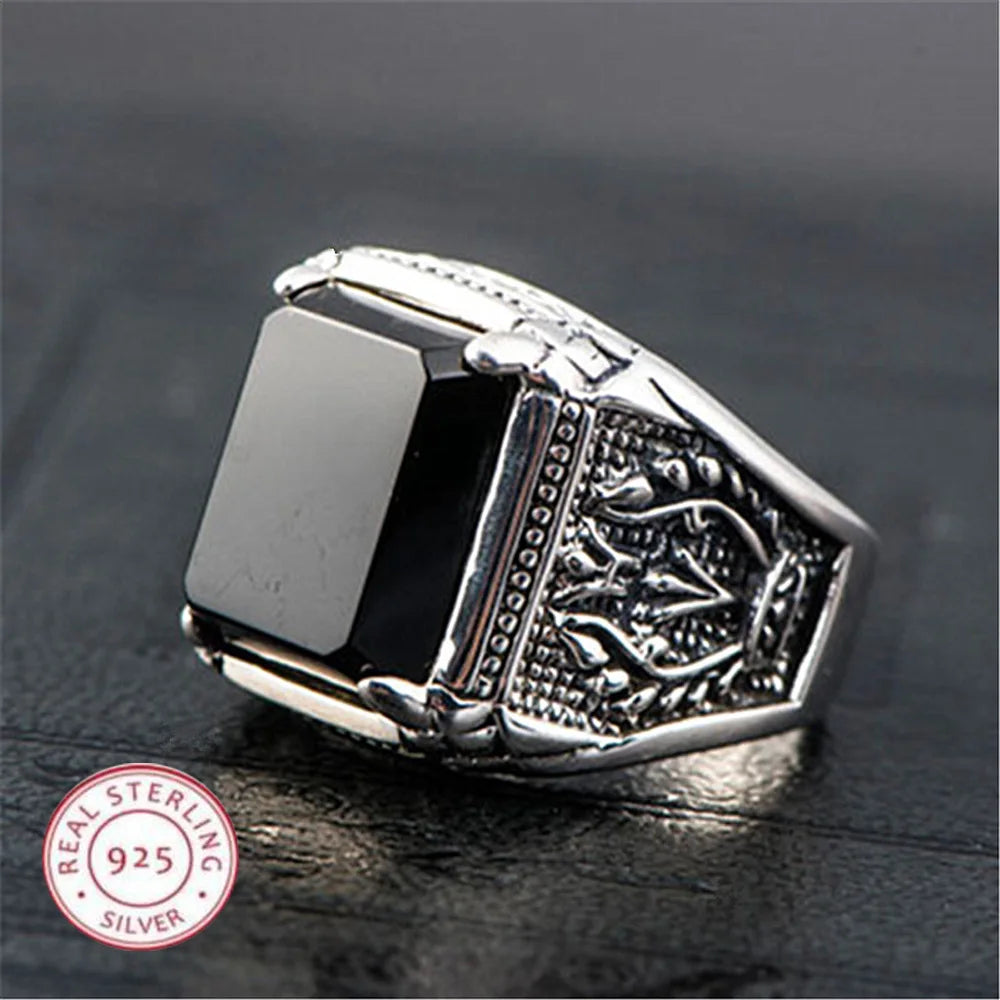 Sterling silver 925 men's rings with high-quality craftsmanship, featuring polished silver bands for a stylish look.