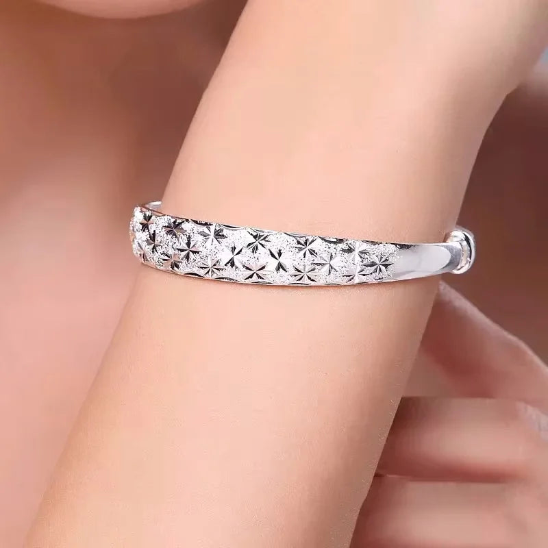 Romantic silver bracelets made of 925 sterling silver with decorative details, perfect for special occasions.