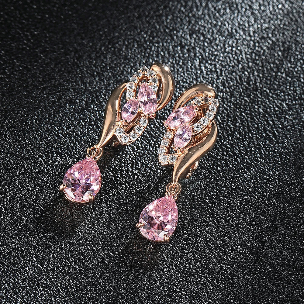 Cubica zirconia drop earrings for women, elegant gold-tone jewelry featuring sparkling teardrop-shaped stones.