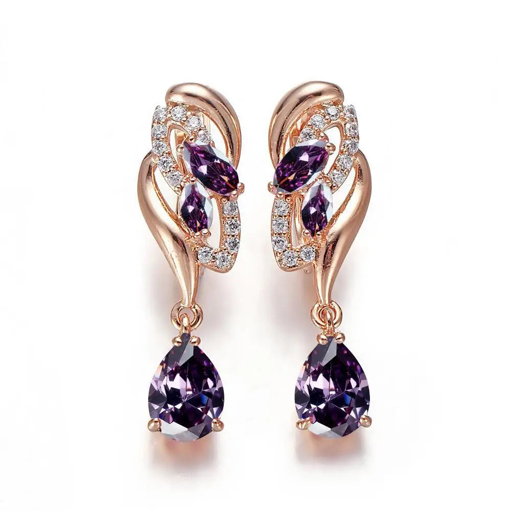 Elegant drop-shaped cubic zirconia earrings for women by Corporación Turística, showcasing sparkling gemstone details.