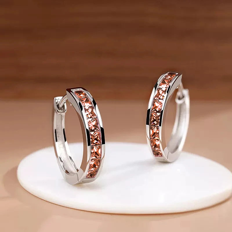 Classic hoop earrings for women by Corporación Turística, featuring a stylish circular design in silver.