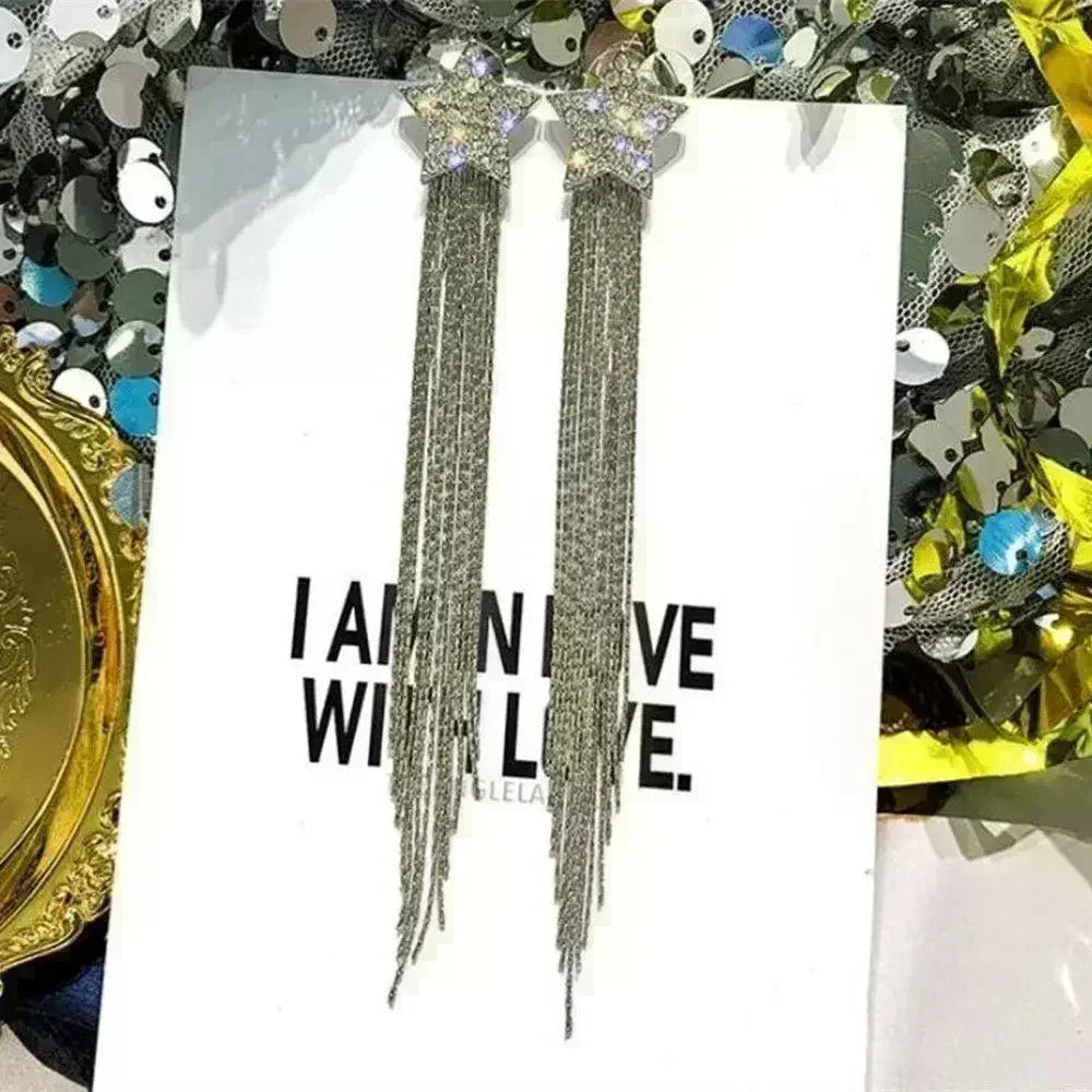 Exquisitos pendientes colgantes de cristal en forma de gota, con diseño elegante, de la marca Corporación Turística.