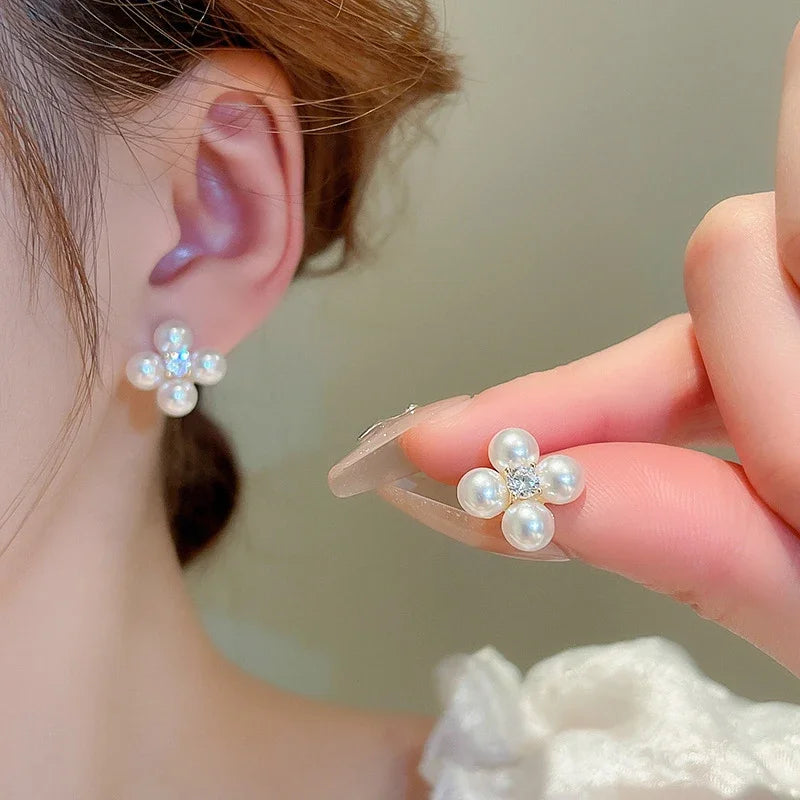 Red retro Pixiu earrings for women, fashion jewelry by Corporación Turística, featuring bold design and intricate details.