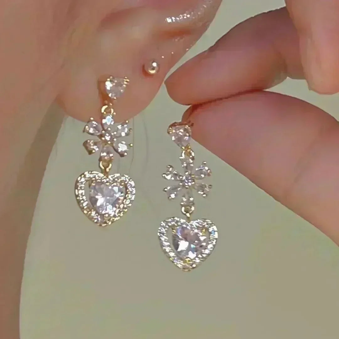 Luxurious green crystal flower earrings by Corporación Turística, elegant jewelry with detailed floral design.