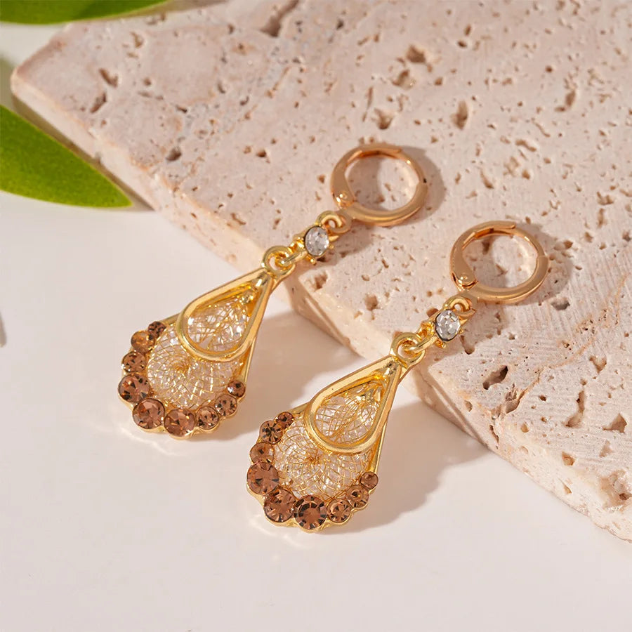 Long crystal drop tassel earrings with colorful beads, featuring elegant dangling design from Corporación Turística.
