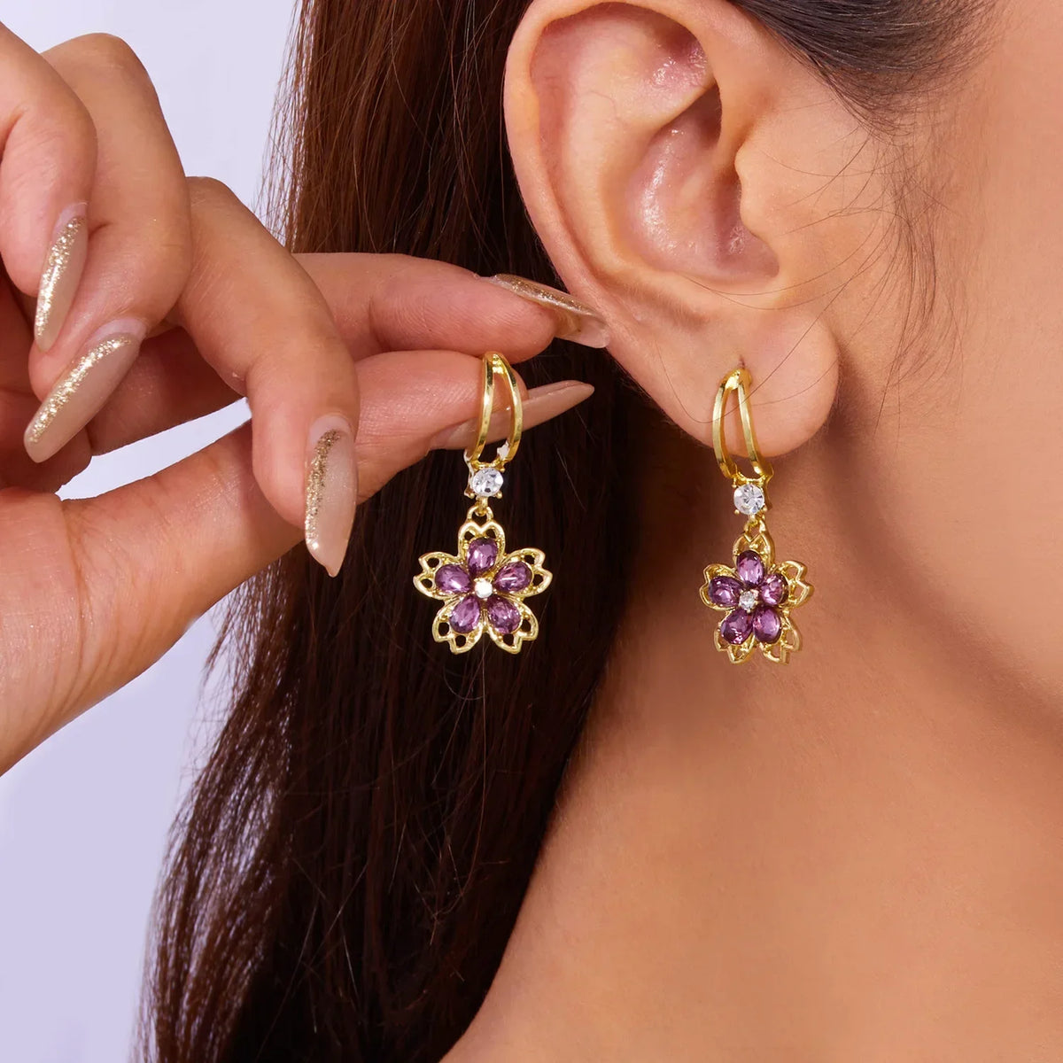 Long crystal drop tassel earrings with colorful beads from Corporación Turística, featuring vibrant dangling crystal borla design.