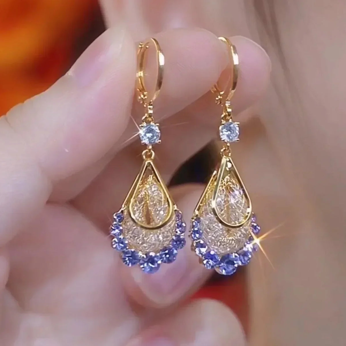 Elegant Crystal Drop Earrings by Corporación Turística featuring intricate hanging glass crystal design.
