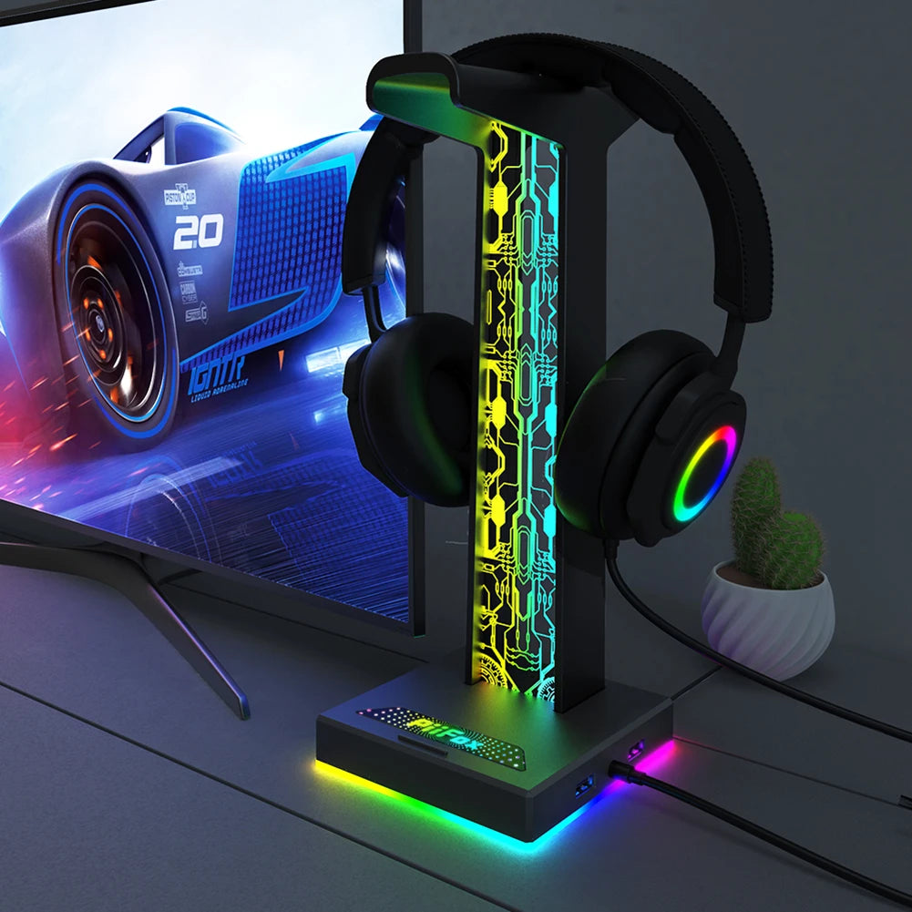Gaming RGB headphone stand with 10 light modes, USB and 3.5mm ports, by Corporación Turística, designed for gaming headphones.