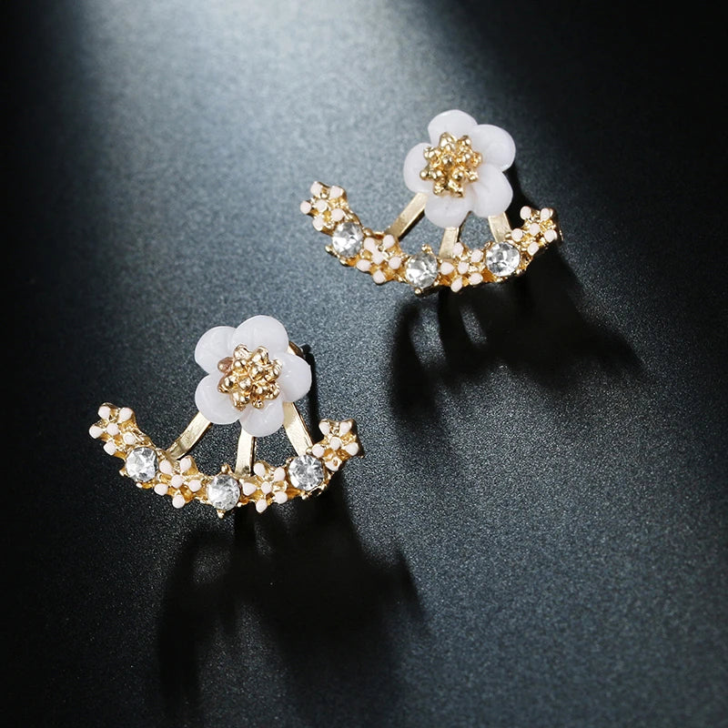 Fashion jewelry 2025 trendy floral earrings by Corporación Turística, featuring colorful flower design and lightweight style.
