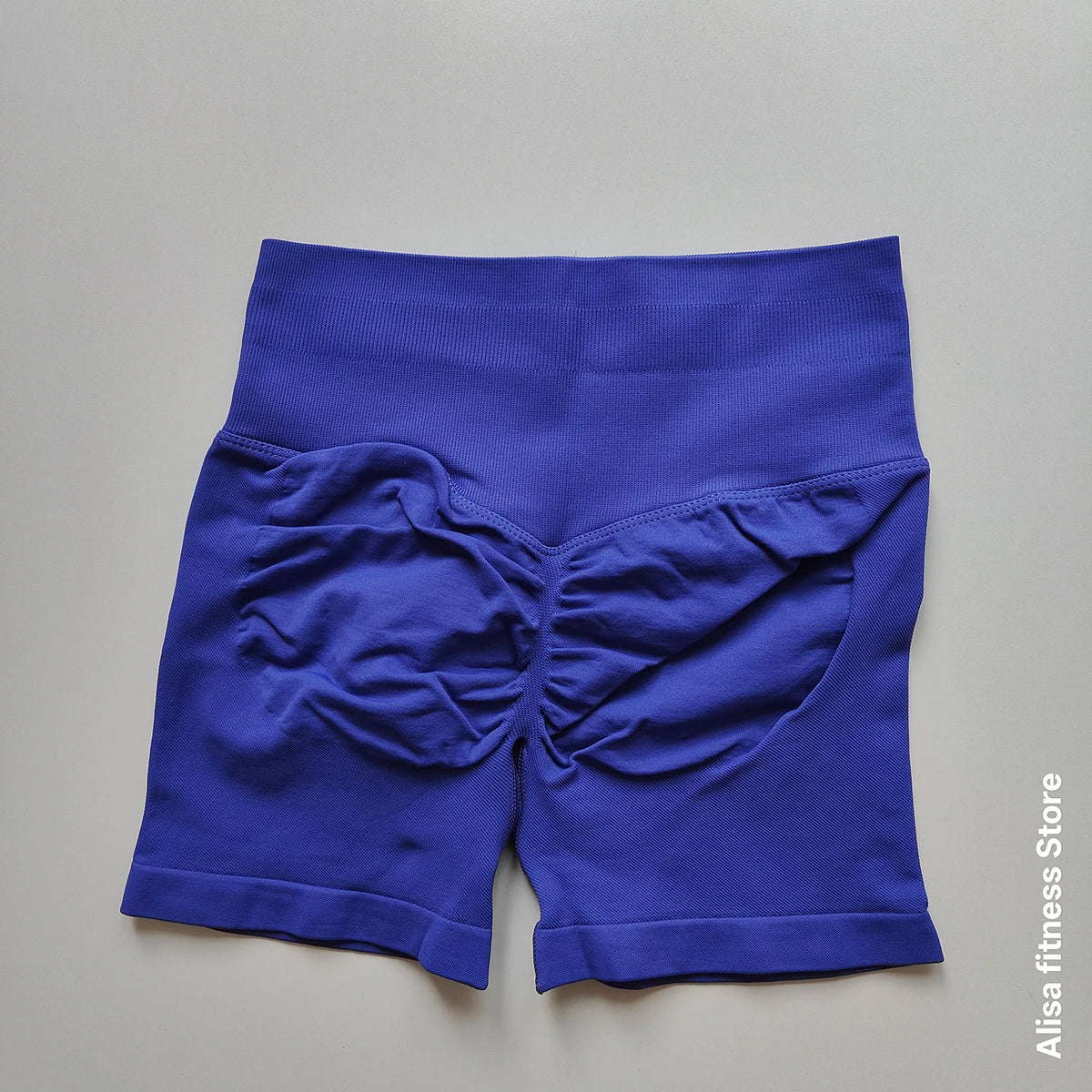 Dark gray high-waist yoga shorts from Corporación Turística, seamless summer activewear for women.