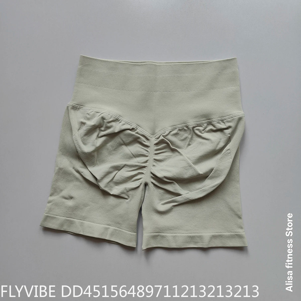 Dark gray high-waisted yoga shorts by Corporación Turística, seamless design, perfect for summer workouts and active wear.