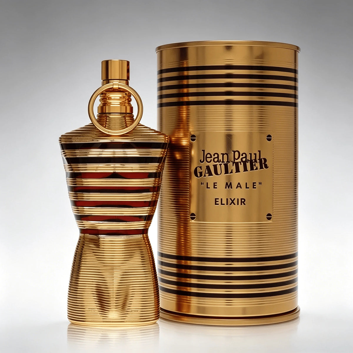 Unisex Jean Paul Gaultier Le Beau Elixir perfume bottle with sleek design, displayed on a neutral background.