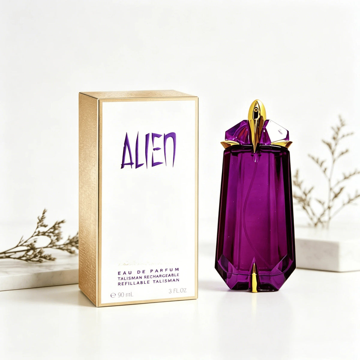 Mugler Alien Eau De Parfum 90ml bottle with rechargeable crystal bottle, elegant fragrance presentation, on a white background.