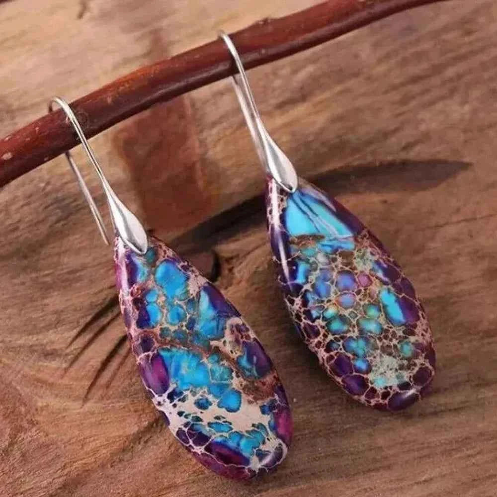 Natural jasper stone pendant earrings with teardrop shape, featuring earthy tones and handcrafted design by Corporación Turística.