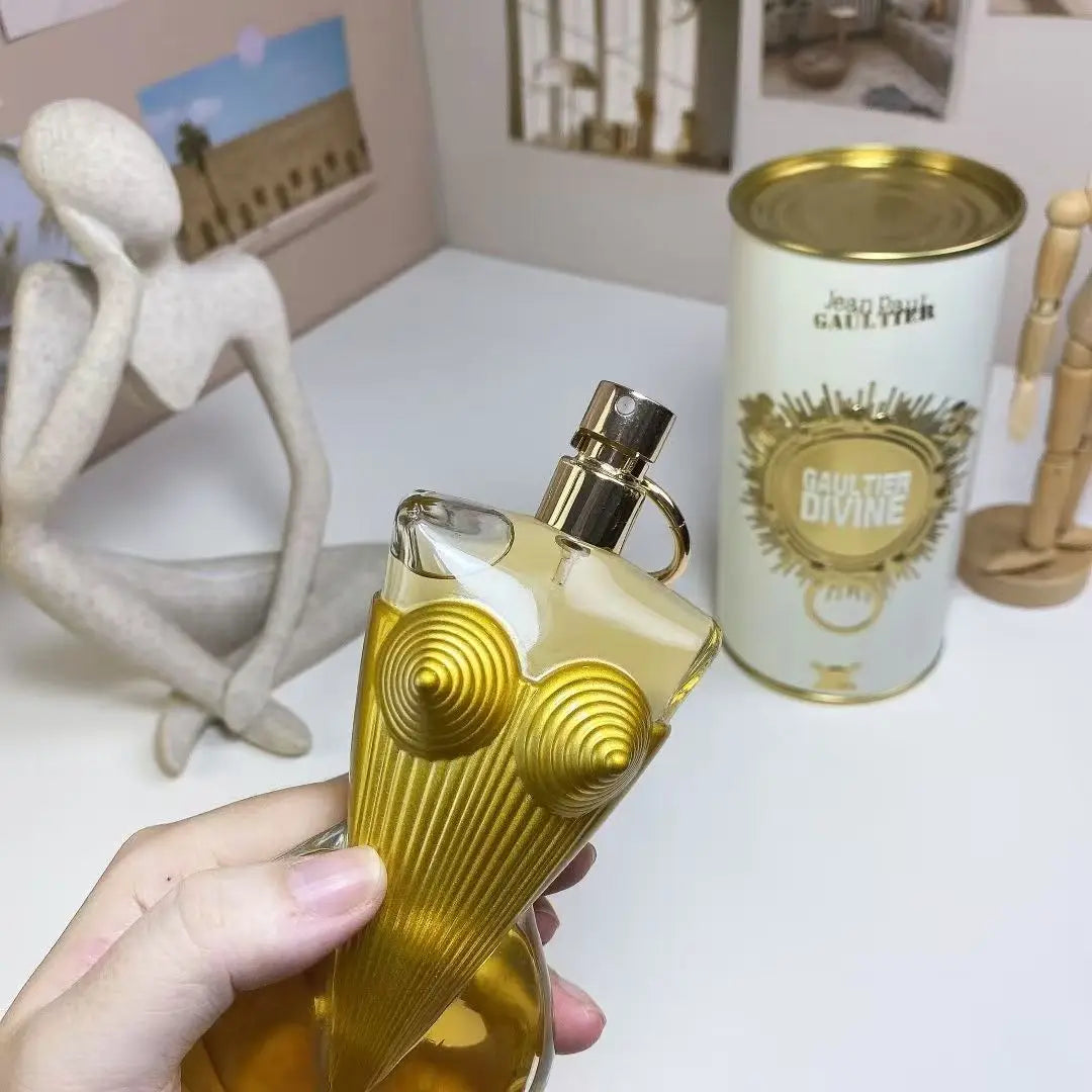 Gaultier Divine perfume bottle with elegant design, showcasing the bright, fragrant aroma of this luxury fragrance.