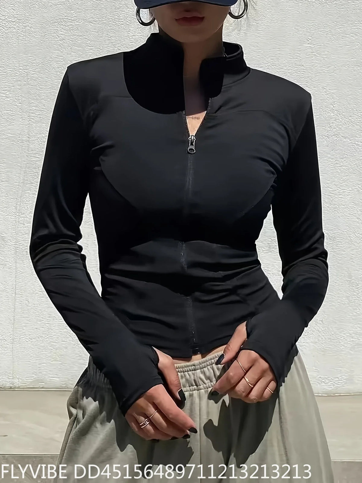 Pink women's quick-dry sports jacket with zipper from Corporación Turística, designed for active wear and outdoor activities.