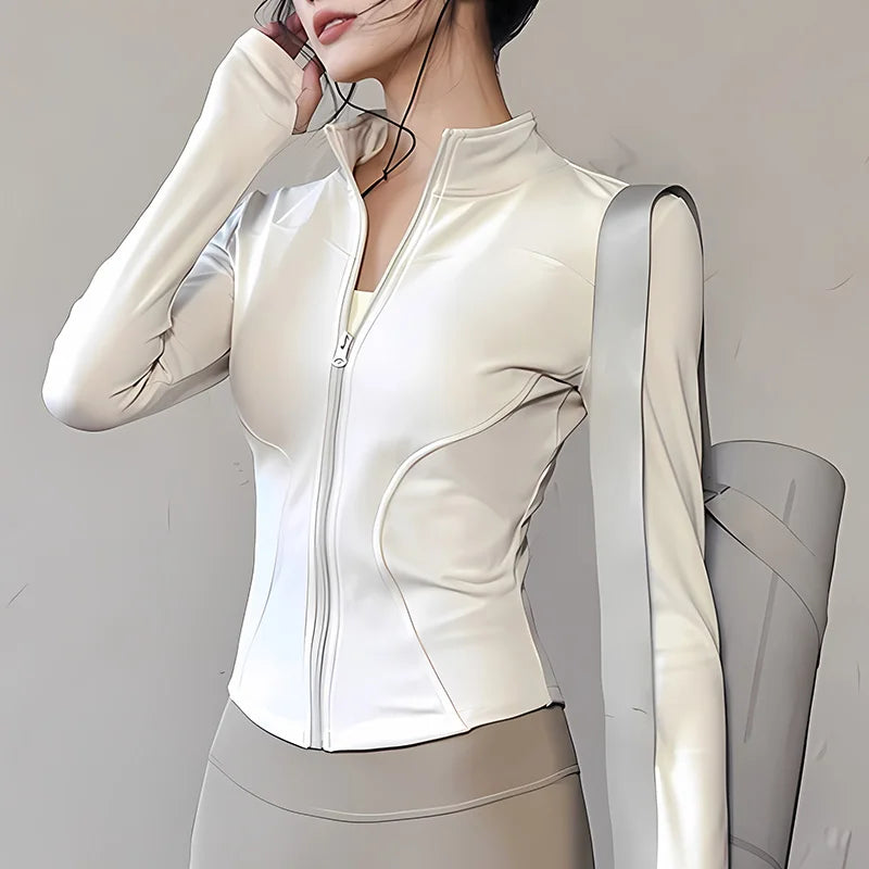 Pink women's quick-dry sports jacket with zipper from Corporación Turística, ideal for active outdoor activities.