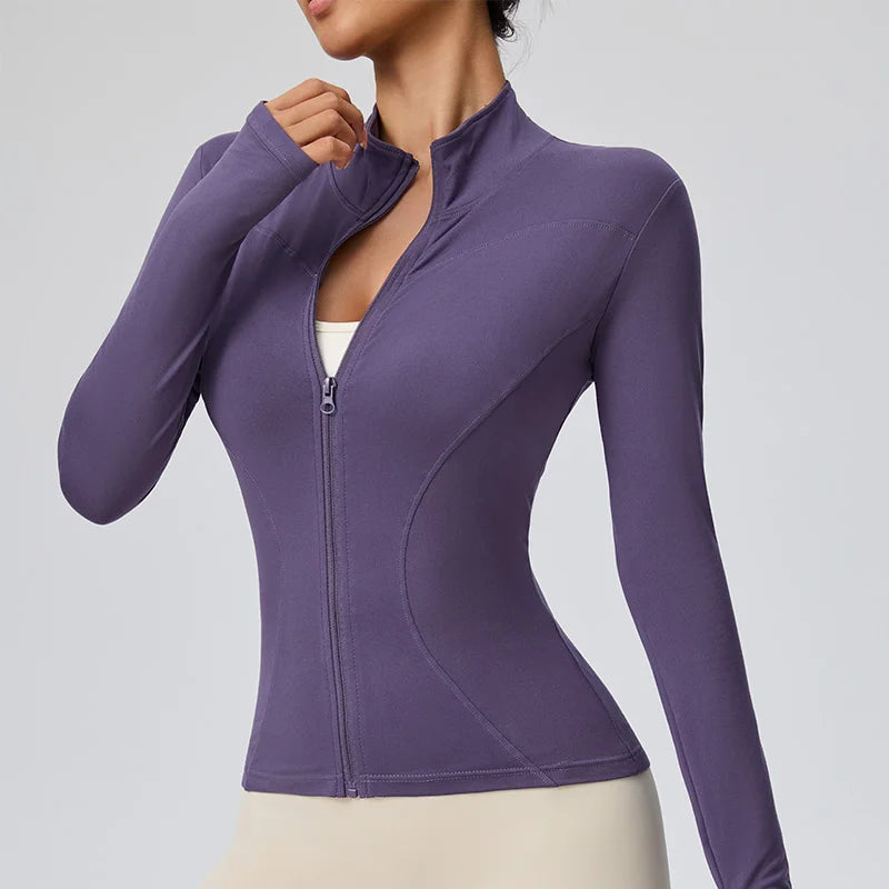 Pink women's quick-dry sports jacket with zipper from Corporación Turística, suitable for active outdoor wear.