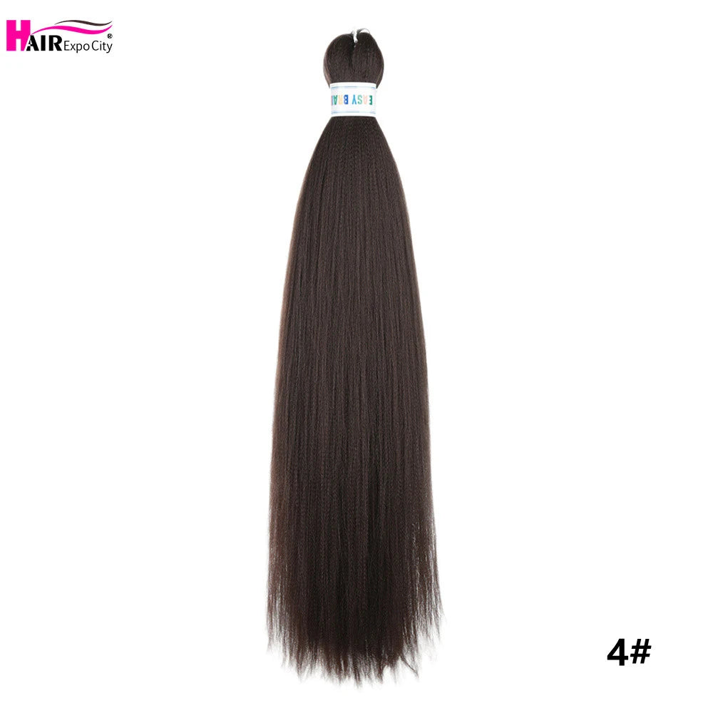 Synthetic 26-inch hair extensions by Corporación Turística, showing three braided trenza extensions in a close-up image.