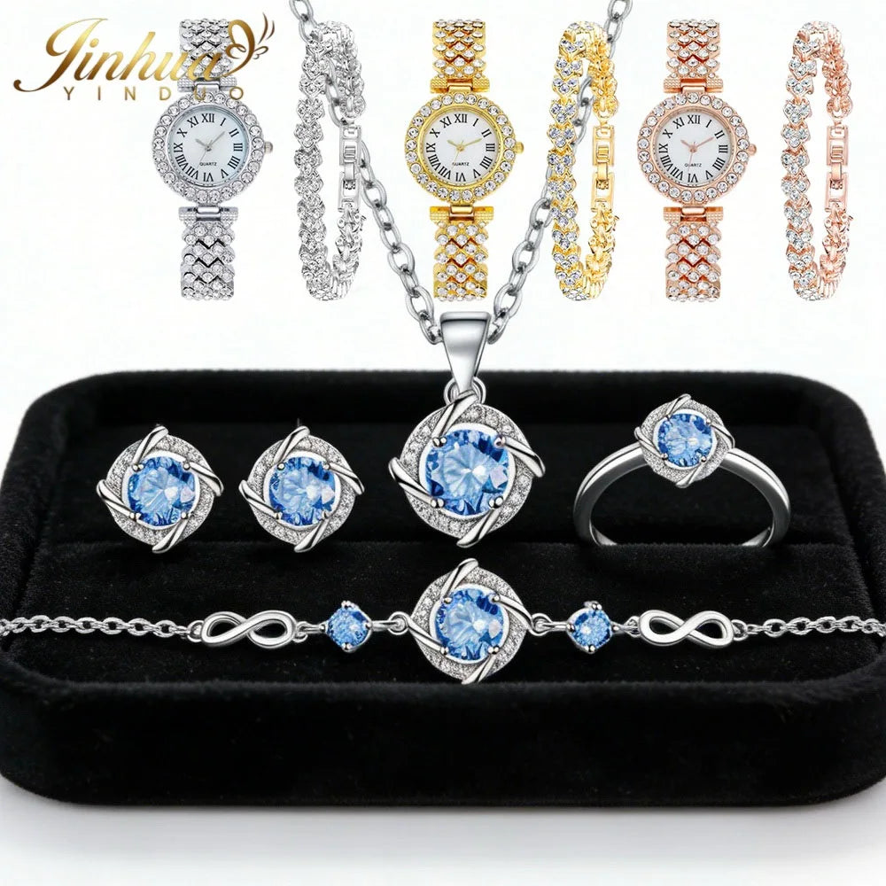 Elegant set of 925 sterling silver jewelry with blue stones, featuring classic design from Corporación Turística.