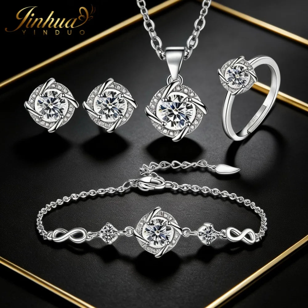 Classic sterling silver jewelry set from Corporación Turística featuring blue stone accents, includes necklace and earrings, 45 cm length.
