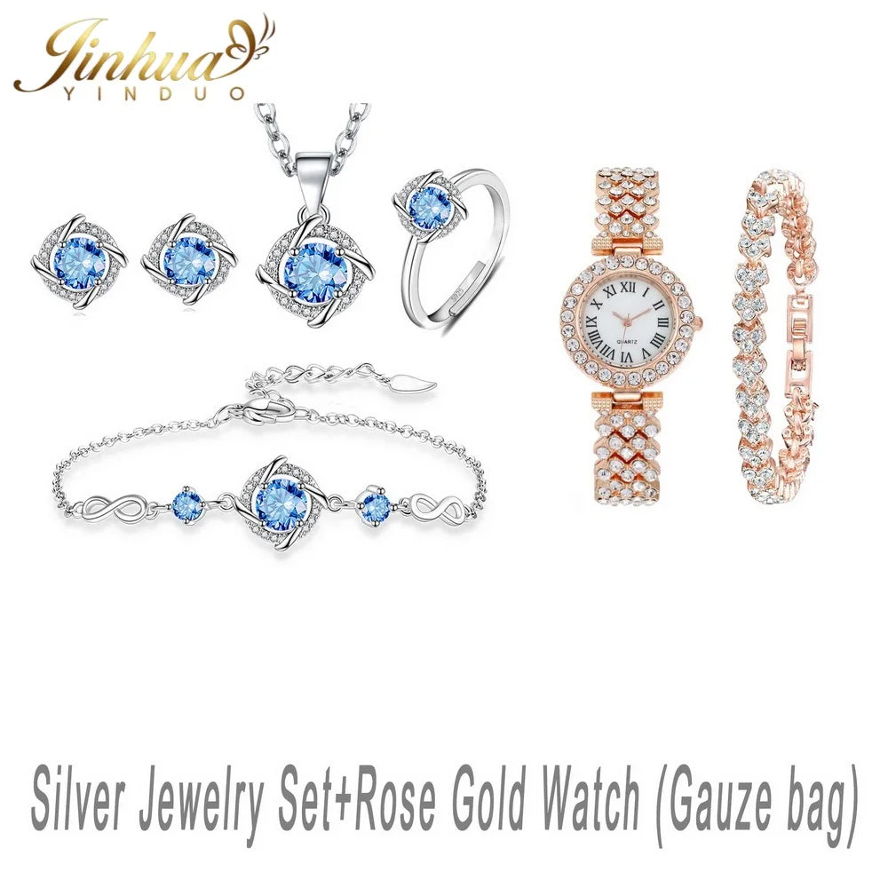 Classic sterling silver jewelry set featuring blue stones, includes necklace and earrings, crafted by Corporación Turística.