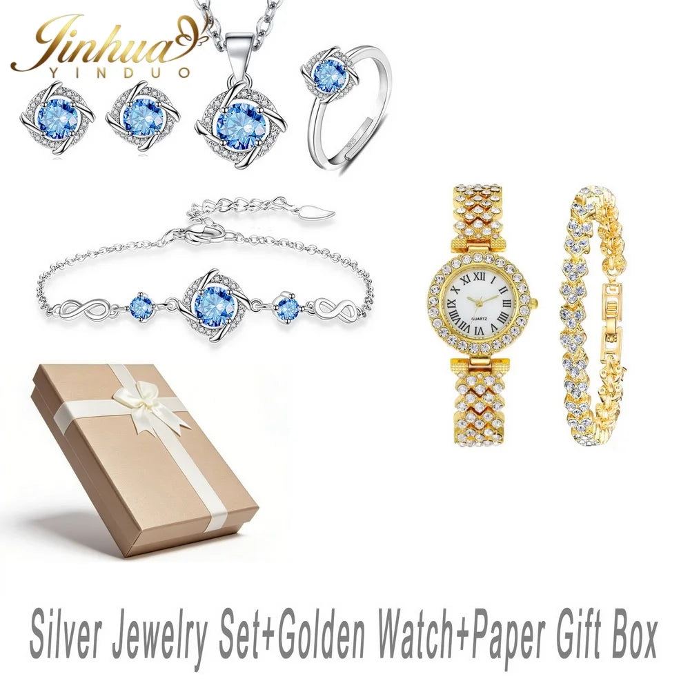 Classic silver jewelry set made of 925 Ley with blue stones, featuring elegant designs and intricate craftsmanship.