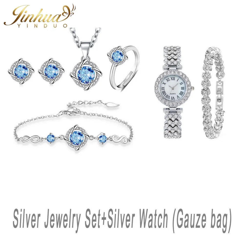 Classic 925 sterling silver jewelry set with blue stone, displayed with a redimensionable gauze bag, from Corporación Turística.