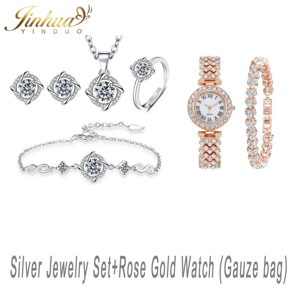 Classic 925 silver jewelry set with blue stone from Corporación Turística, featuring elegant necklaces and earrings in a stylish design.