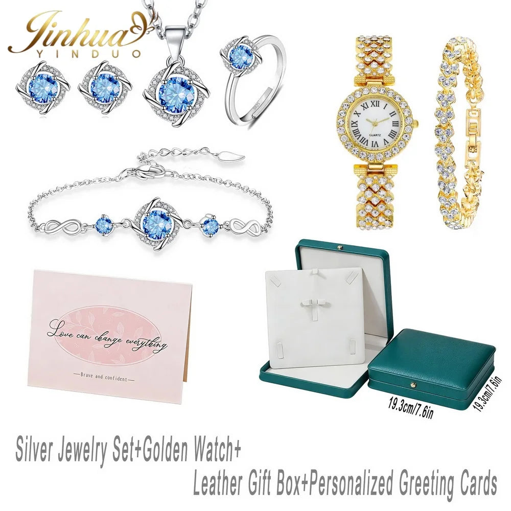 Silver 925 jewelry set with classic design, featuring blue stones, from Corporación Turística, displayed on a gauze bag.