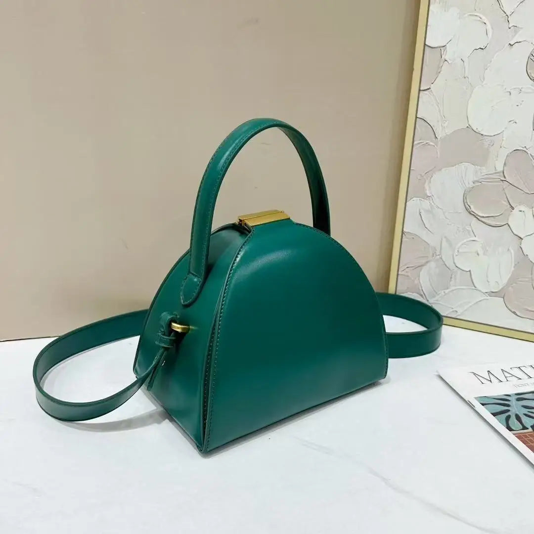 Gold PU shoulder bag for women with niche design, featuring a compact rectangular shape and stylish modern look.