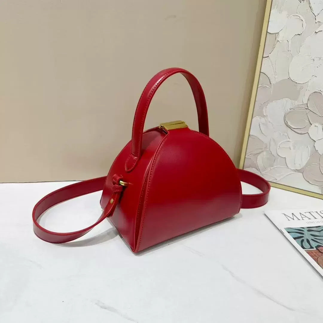 Gold PU shoulder bag for women with niche design, from Corporación Turística, featuring a 22x14x19cm compact style.